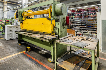 Metalworking shop. Guillotine shears machine