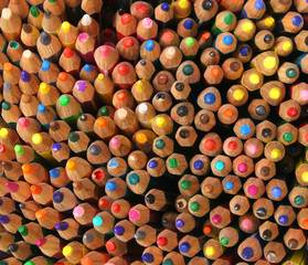 Fototapeta na wymiar background of colorful pencils used by children during the drawi