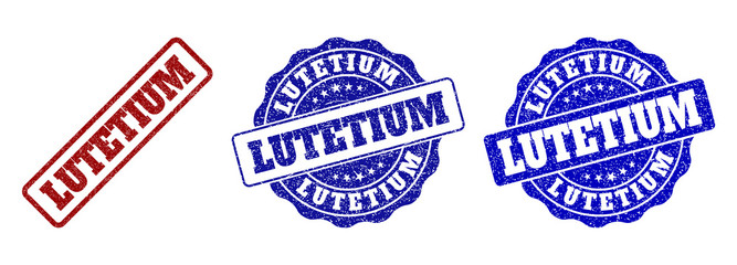 LUTETIUM grunge stamp seals in red and blue colors. Vector LUTETIUM overlays with grunge surface. Graphic elements are rounded rectangles, rosettes, circles and text tags.