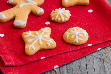 Obraz na płótnie Canvas Homemade Christmas cookies on red napkin
