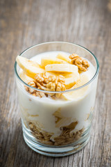 Obraz na płótnie Canvas Healthy breakfast with banana and nuts. Selective focus.