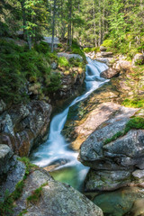 The Studenovodske waterfalls on a stream in the forest, High Tatras National Park, Slovakia, Europe.