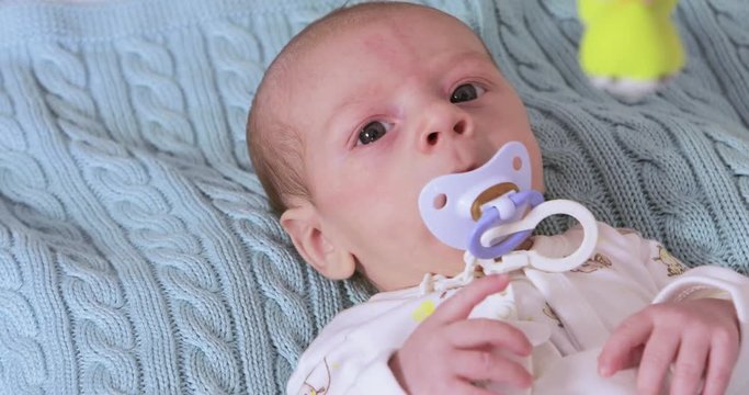 Baby with pacifier