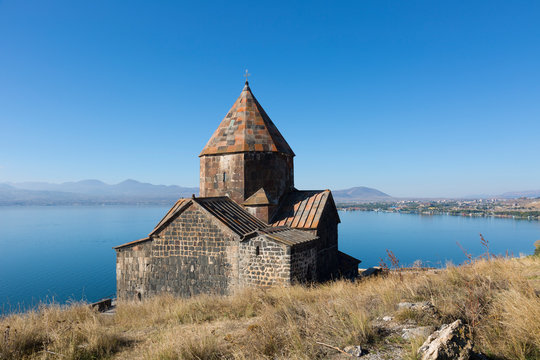 Scenic view of an old Sevanavank church in Sevan, on sunny day . Armenia