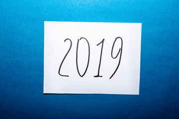 2019 Happy New Year card with numbers on blue background