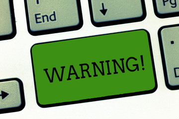 Conceptual hand writing showing Warning. Business photo showcasing statement or event that warns of...