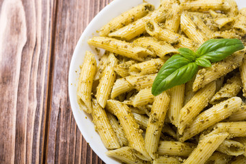 Italian penne pasta with sauce pesto