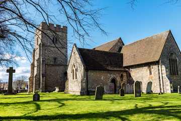 Fototapeta premium All Saint's Church in Snodland, Near Maidstone, Kent, England, sitting near the banks of the River Medway taken on a warm spring afternoon.