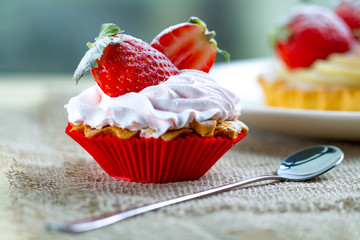 Tasty strawberry cake with cream and fresh strawberries. Pastry. Sweet dessert