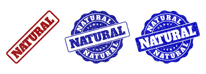 NATURAL scratched stamp seals in red and blue colors. Vector NATURAL watermarks with dirty style. Graphic elements are rounded rectangles, rosettes, circles and text captions.
