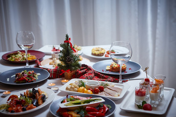 Beautifully set table in Christmas.Beautiful Christmas table setting.