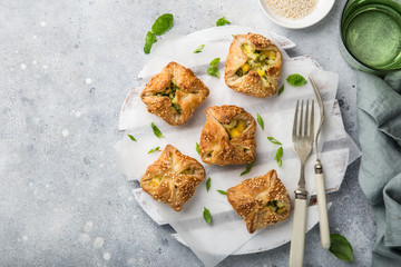 puff pastry stuffed with eggs and spinach