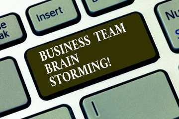 Handwriting text Business Team Brain Storming. Concept meaning Team work corporate group working meeting Keyboard key Intention to create computer message pressing keypad idea