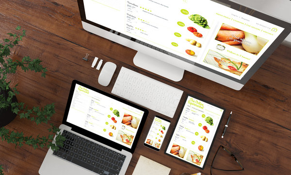 devices collection top view with online supermarket website