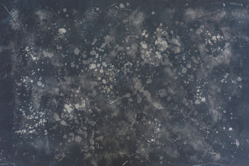 Black texture can be used for background. Dark texture with a pattern. Black and gray spots.