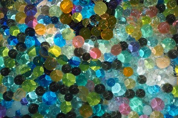 Multicolored hydrogel balls texture background.