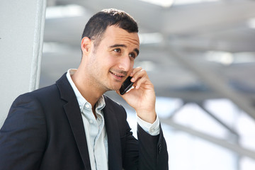 Close up businessman talking on cellphone