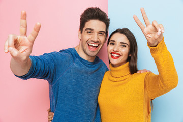 Cheerful young couple standing