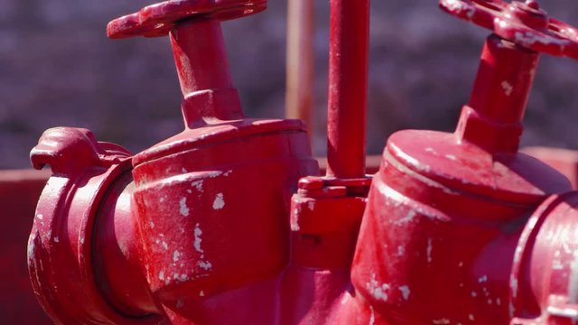 Red colorful fire hydrant on the street