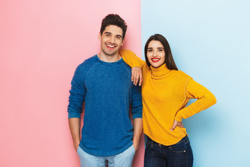 Cheerful young couple standing