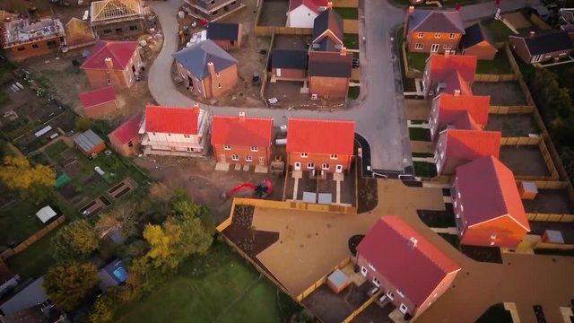 New build housing development under construction Aerial drone shot UK