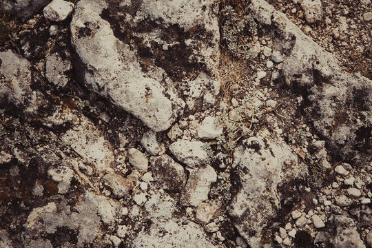 Fototapeta burnt dark detailed stone texture close up