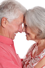 Portrait of a happy senior couple on white background