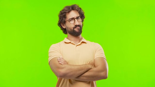 young cool man against chroma key background 