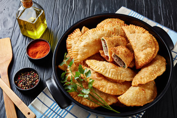 deep fried turnovers or chebureki, close-up