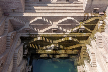 Fototapeta na wymiar A huge irrigation facility with a staircase geometric pattern in a small village in India, which is also expected to be registered as a World Heritage Site