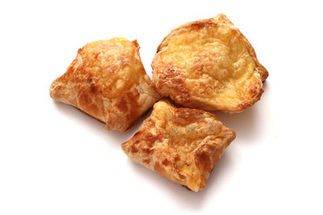 bun with baked cheese on a white background