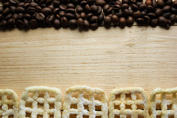 Fototapeta na wymiar coffee beans on wooden background