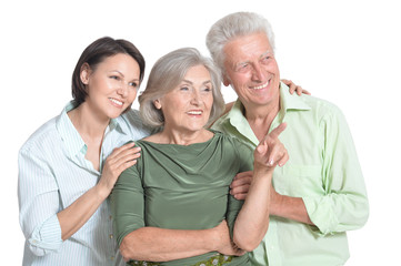 Happy senior parents with daughter, on white background