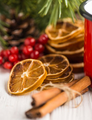 Greeting card for congratulation New Year with dry handmade decorations on a wooden white background, copy space.