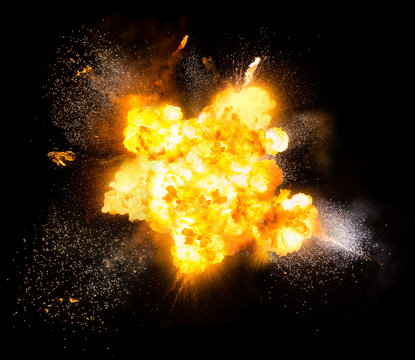 Realistic fiery explosion over a black background