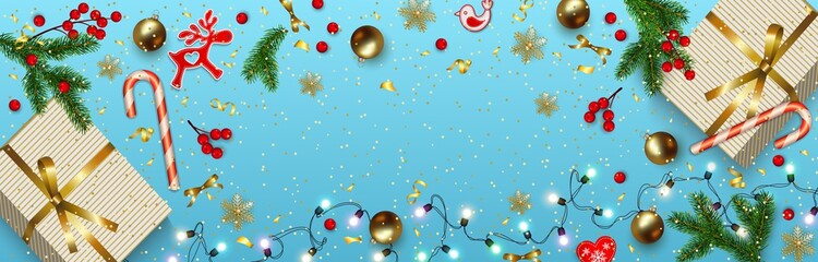 Horizontal Christmas banner with fir branches, golden balls, gift boxes, holly berries, lollipop