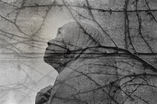 Grey Double Exposure Of Poor Hopeless Woman In Hijab With Grunge Branch Old Wall Background