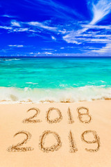 Fototapeta na wymiar Numbers 2019 on beach