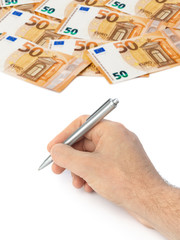 Hand with pen and euro money