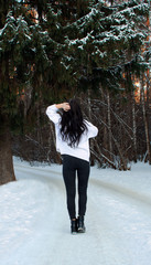 young woman on front of forest