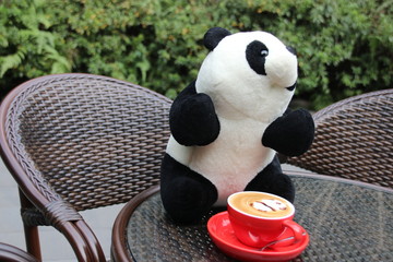 Panda Plush Doll and a cup of Latte © foreverhappy