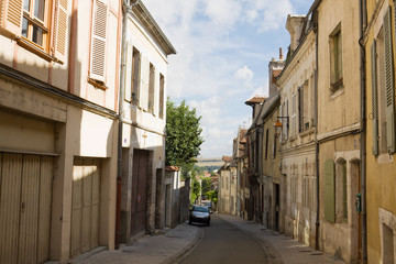 Fototapeta na wymiar An ancient lane in the suburbs of Auxerre city in France