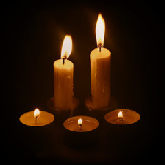 burning candles in the dark
