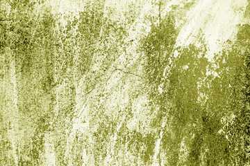 Сraked weathered cement wall texture in yellow tone.