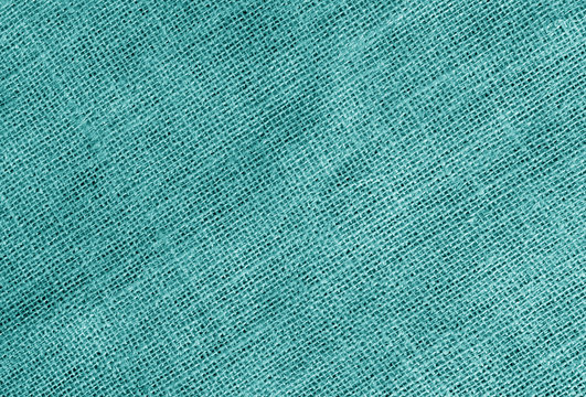 Linen cloth texture in cyan color.