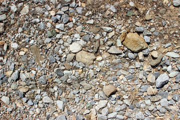 Gravel dirt road stones close up horizontal