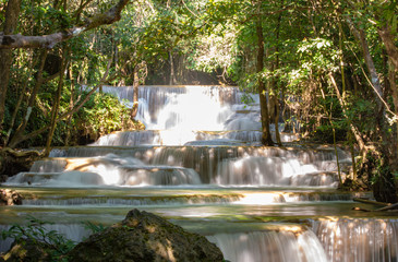 Fototapeta premium Waterfall flowing from the mountains at Huay Mae khamin waterfall National Park ,Kanchana buri in Thailand.