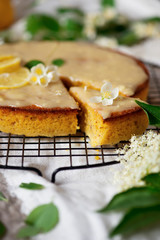 lemon polenta cake elderflower white chocolate ganache..
