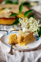 lemon polenta cake elderflower white chocolate ganache..