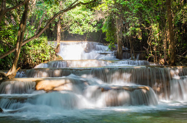 Fototapeta premium Waterfall flowing from the mountains at Huay Mae khamin waterfall National Park ,Kanchana buri in Thailand.